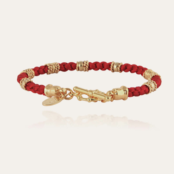 pulsera Pulsera en hilos de seda delicadamente trenzados, color rojo, adornada con adornos