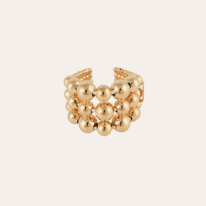 Anillo flexible compuesto por un elegante ensamblaje de múltiples perlas doradas con oro fino. Tamaño ajustable. Altura: 1,6 cm - Circunferencia: 4,5 cm