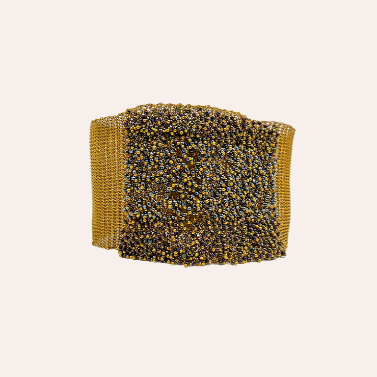 Brazalete malla oro con cuentas negras y oro